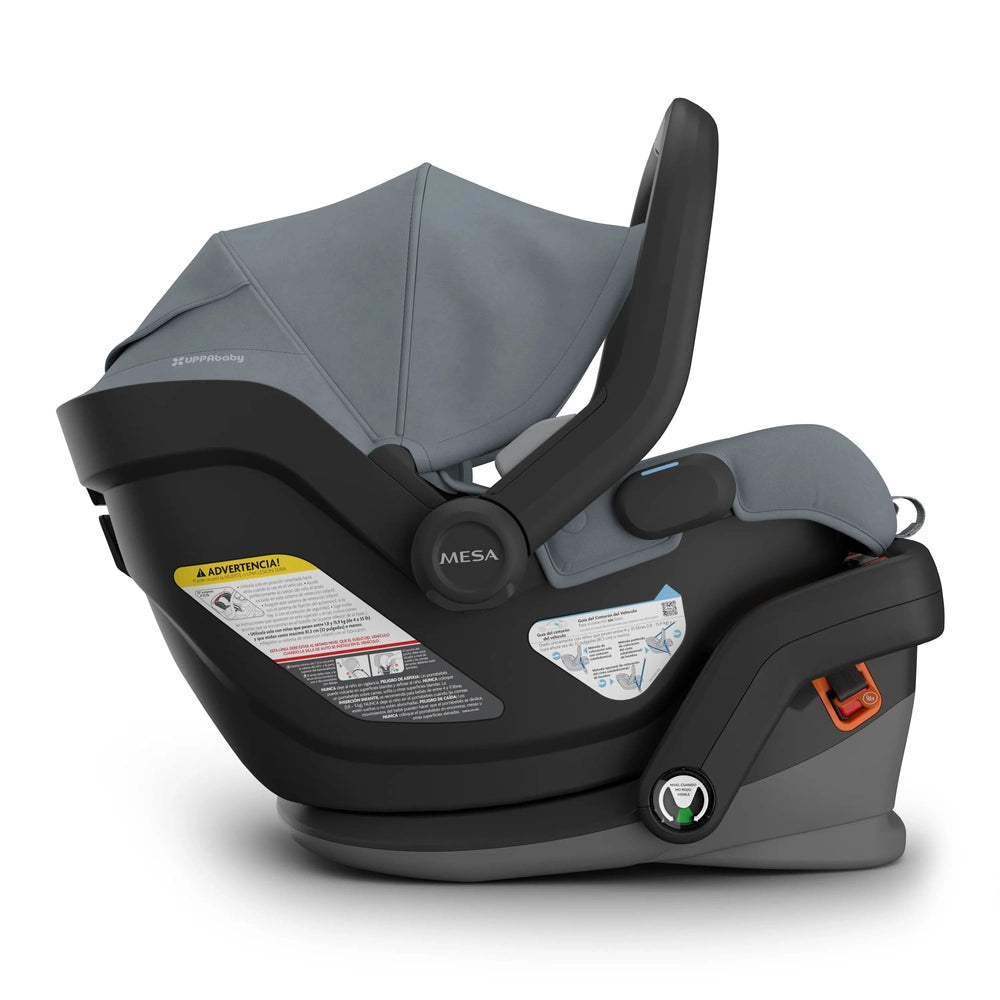 UPPAbaby Mesa V3 Infant Car Seat in gray with black base and handle, featuring visible instruction labels.