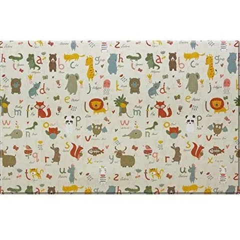 Baby Care Playmat Medium spread on a floor with colorful animal illustrations and alphabet letters.