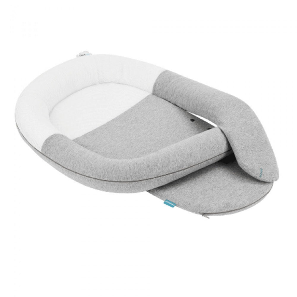 Babymoov Cloudnest Newborn Lounger in light gray and white with a cushioned nest