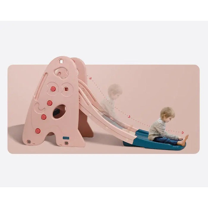 BC Babycare 5 In 1 Slide pink plastic playground set with blue base, child sliding down.