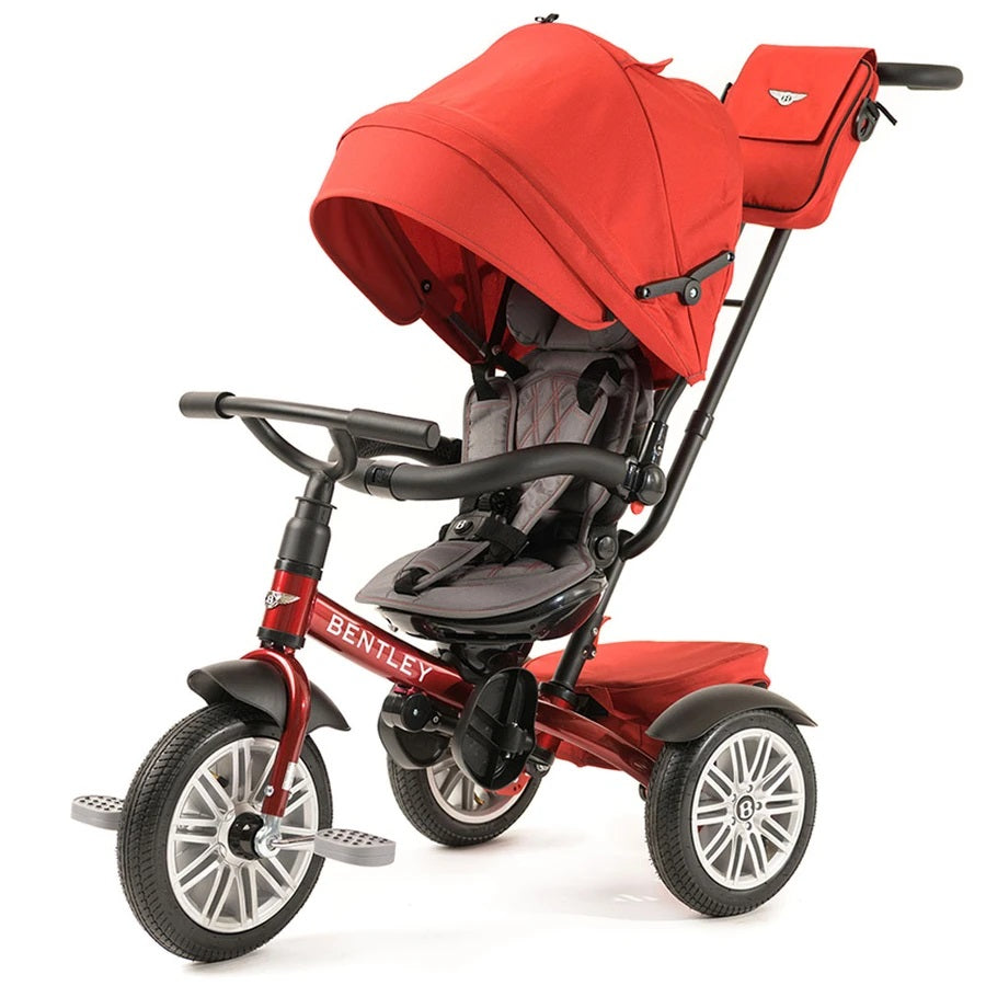 Bentley Trike 6-In-1 V2 Dragon Red toddler trike with red canopy and rear storage bag in use.