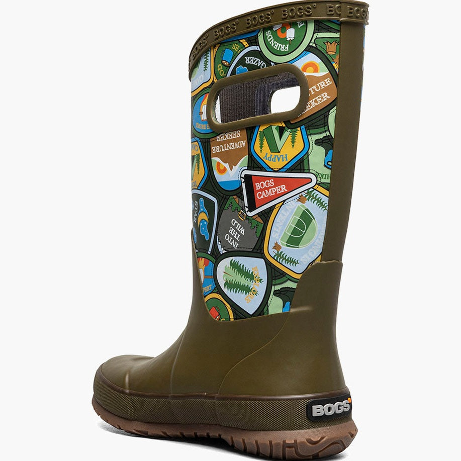 BOGS Rainboot Camping Patches Army Green Multi for kids; durable rubber boot with colorful patches, shown standing upright.