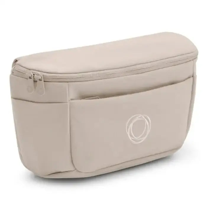 Bugaboo Organizer bag in beige with zip-top closure and front pocket for stroller storage.