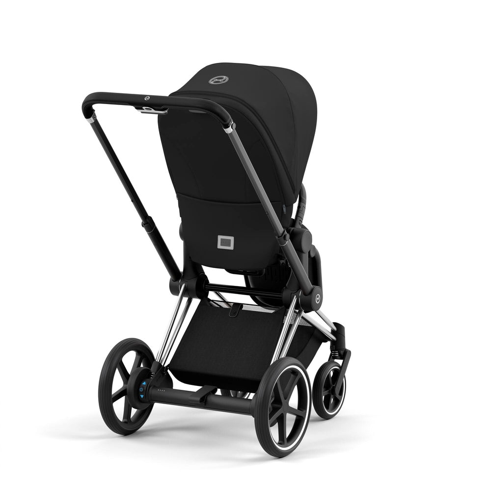CYBEX e-Priam Chrome Frame/Deep Black Seat Pack + Lux Carry Cot bundle, stroller shown with extended handle and canopy.