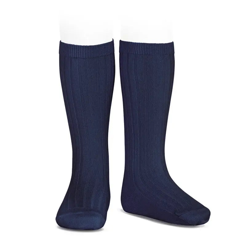 Condor Basic Rib Knee High Socks Navy worn on kid-sized legs, rib-knit fabric keeps feet warm.
