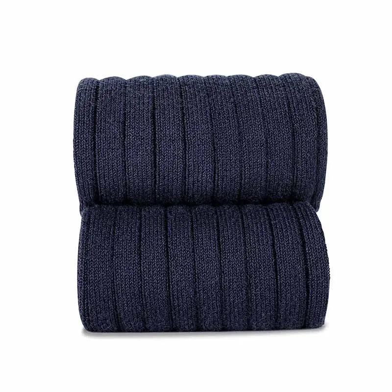 Condor Basic Rib Knee High Socks Navy, kids' navy rib-knit socks folded into a neat pair, showing soft knit warmth.