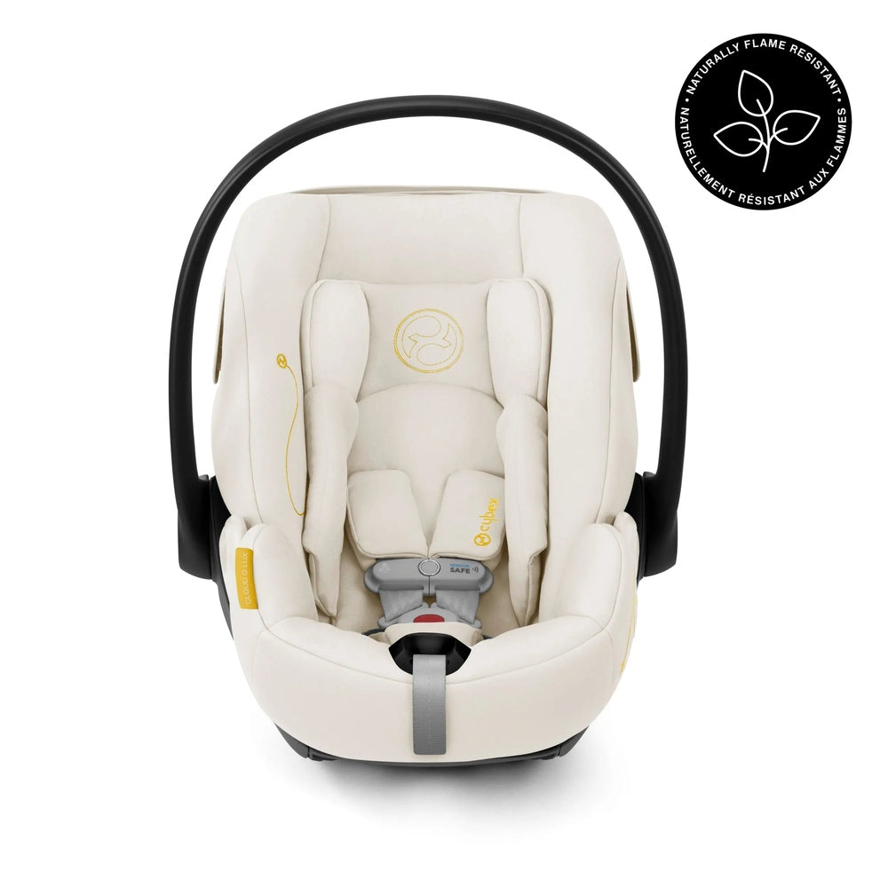 CYBEX Cloud G Lux reclining infant car seat in cream with a black carry handle
