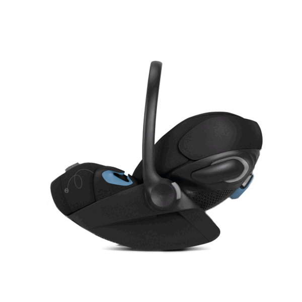 Cybex Cloud G Lux reclining infant car seat in black with blue accents, shown with an ergonomic carry handle.
