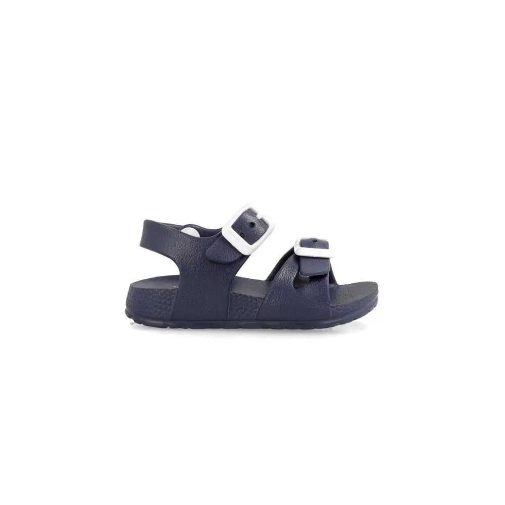 Garvalin Sandalia Hebillas Sandy navy sandal with white buckles and adjustable straps, side view.
