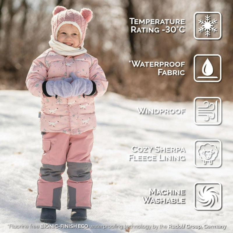 JAN & JUL Waterproof Winter Coat Pink Forest on a smiling child in snow, showing cozy fleece lining and windproof, waterproof design
