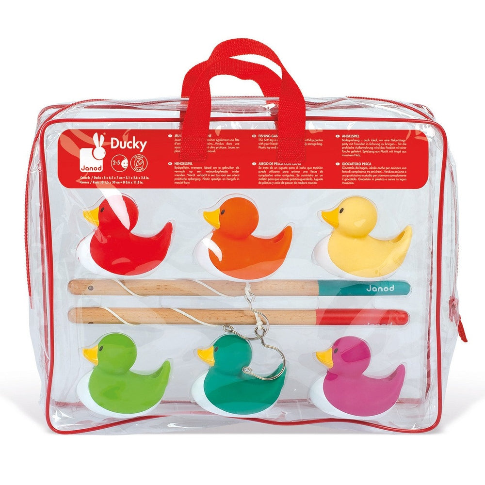 Janod Ducky Fishing Game in a clear zip bag; six colorful ducks and three wooden rods with hooks ready for fishing.