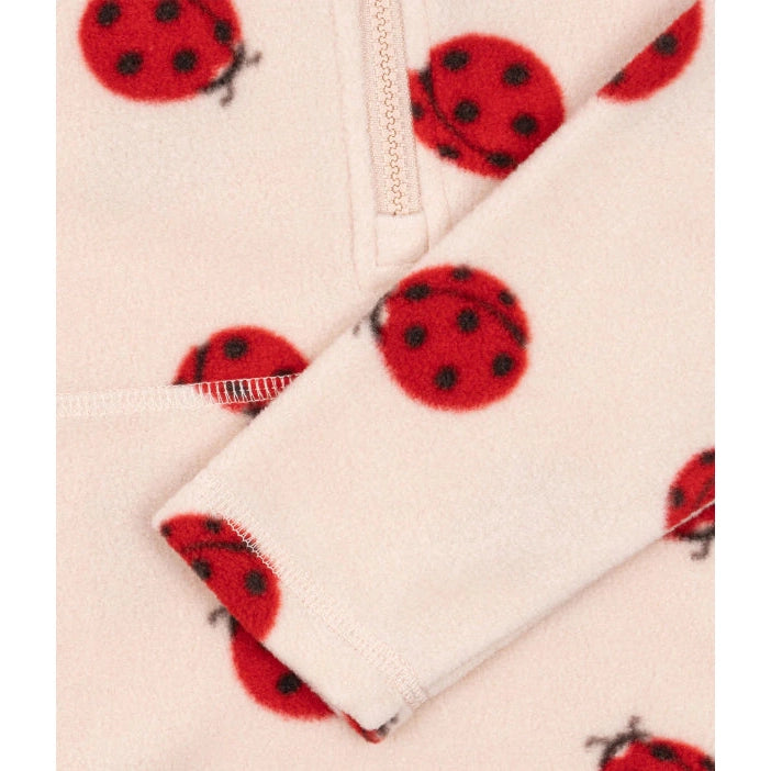 Konges Slojd Tavi fleece sweatshirt; cream fabric with red ladybug print