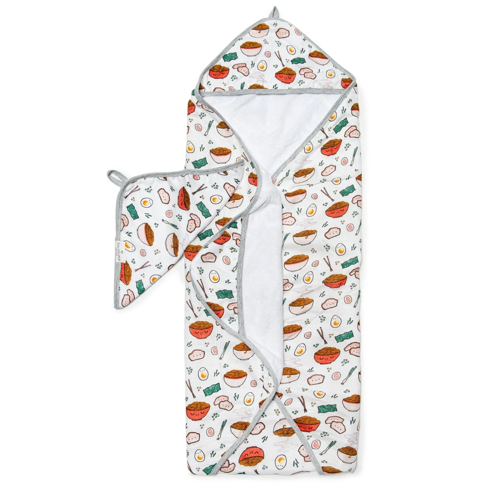 Loulou Lollipop Hooded Towel Set, white towel with gray trim and playful food-print hood, ready to wrap baby.