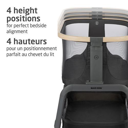 MAXI COSI Iora bedside bassinet with dark frame and mesh sides, showing 4 adjustable height positions.