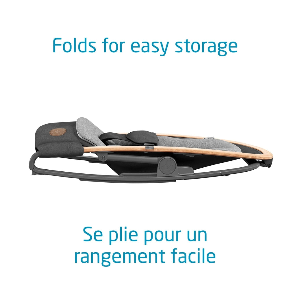 Maxi-Cosi Kori Rocker folded for easy storage; gray upholstery with wooden frame.