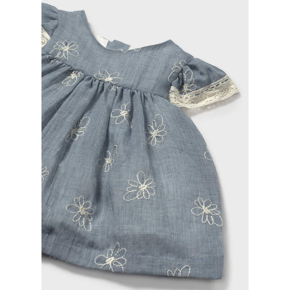 Mayoral newborn dress with bloomers in blue stone, cream floral embroidery and lace-trim sleeves.