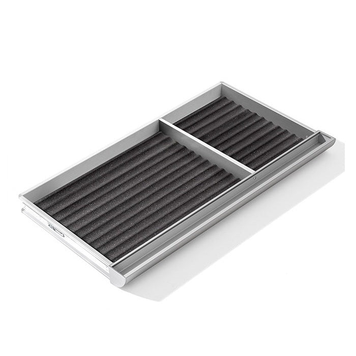 Moll Champion Compact Drawer with metal frame and two partitioned foam-lined compartments for desk organization.