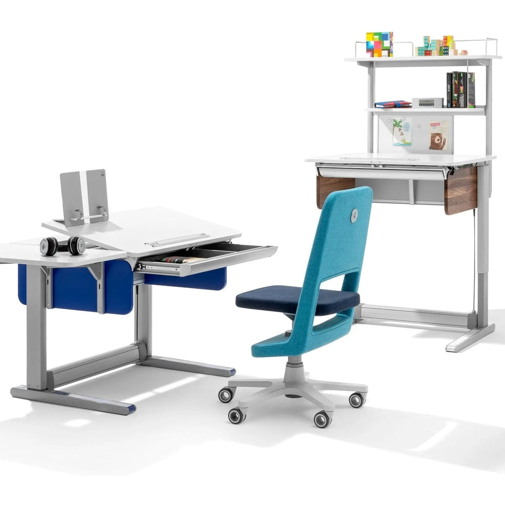 Moll Champion Compact Express height-adjustable desk with white top and blue panels, shown with hutch and teal rolling chair.