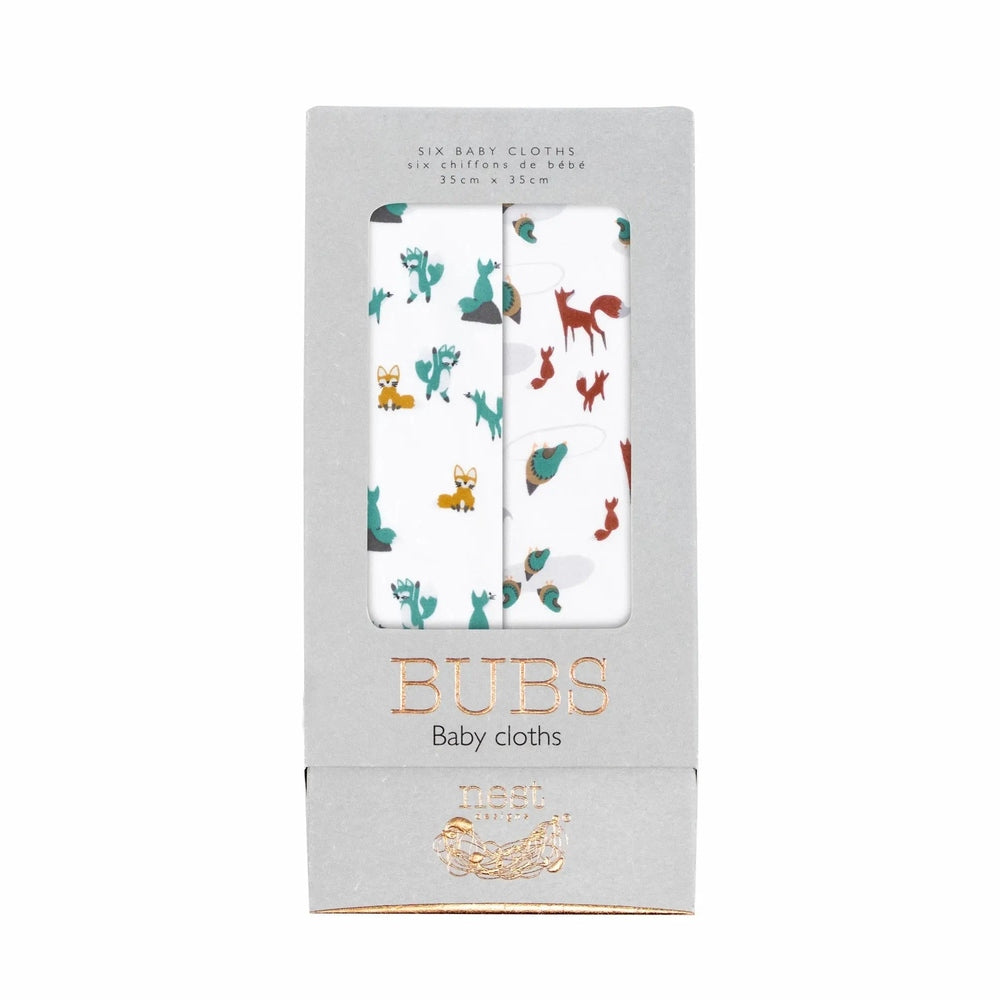 Nest Designs Bamboo Bubs Baby Washcloth Set (6-pack) with teal and red animal prints visible through the package window.