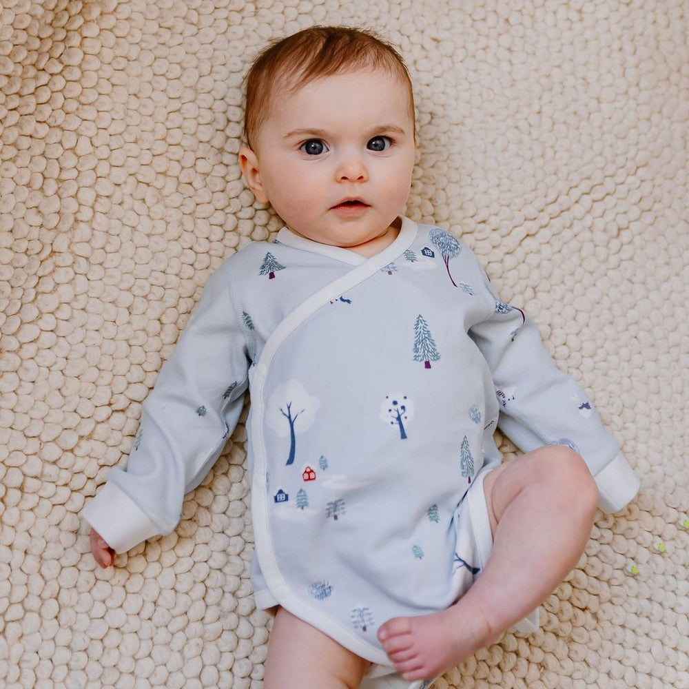 Nest Designs Organic Cotton Long Sleeve Kimono Onesie Snowy Snuggles in pale blue with tree pattern for newborns