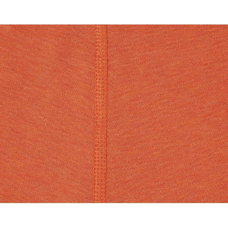 Nest Designs Tanboocel Pants Pantone Apricot Orange close-up fabric with visible seam, warm and cozy.