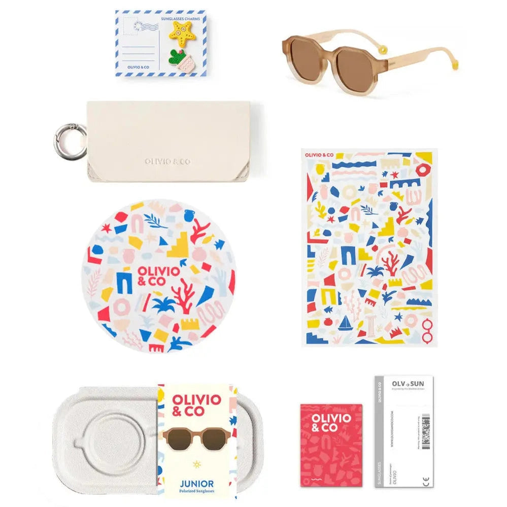 OLIVIO & CO Square Sunglasses Junior+ Creative Edition D Desert Sand shown with beige hard case and cleaning wipes.