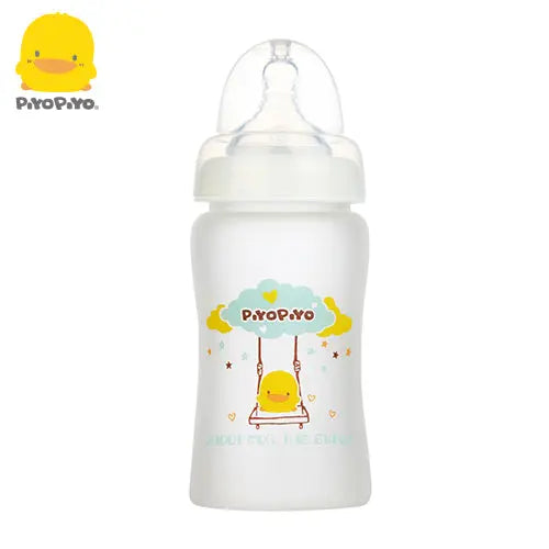 Piyo Piyo Silicone Wide-Neck Glass Baby Bottle with a swinging yellow chick on a cloud graphic.