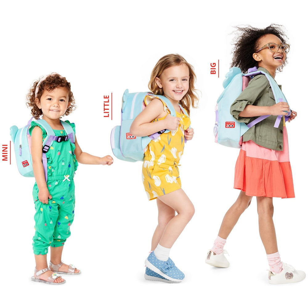 Skip Hop Koala backpack with safety harness; three kids wear pastel mini, little, and big backpacks.