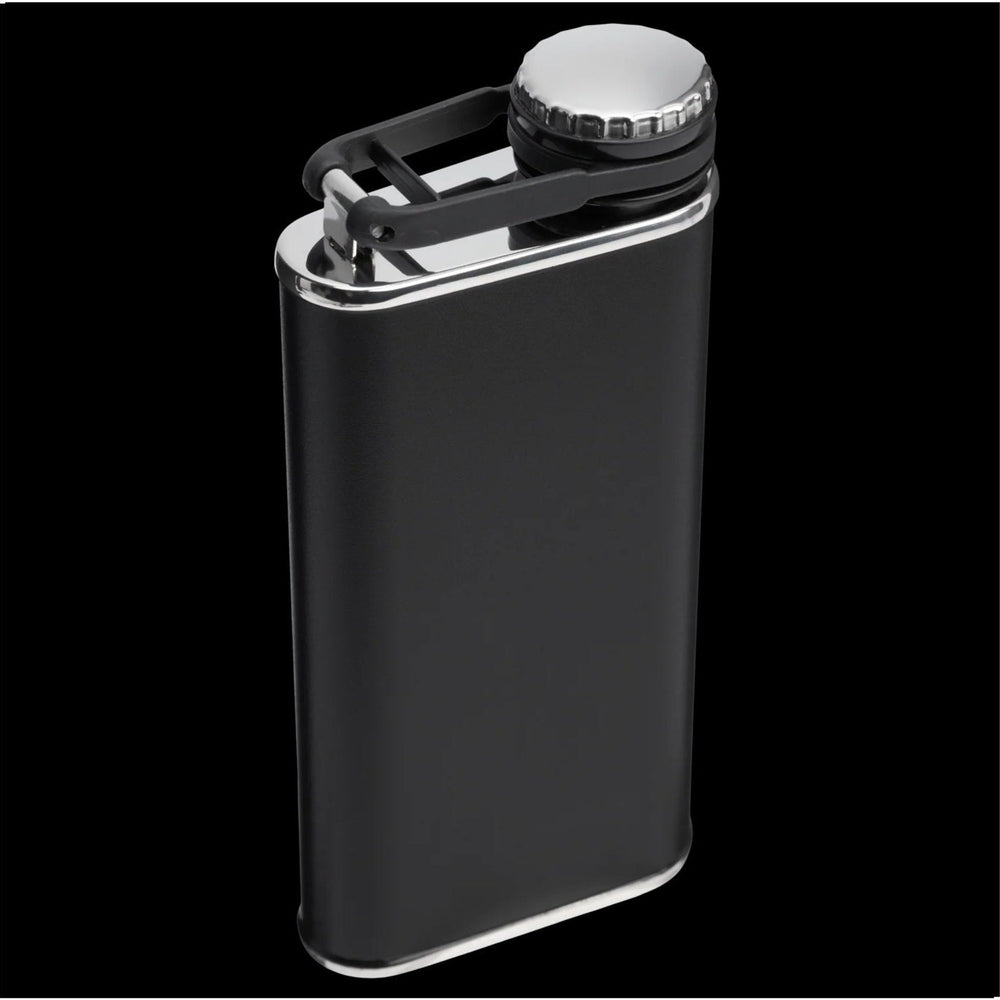 Stanley Classic Flask 8oz in black with chrome trim and attached strap, cap secured on.