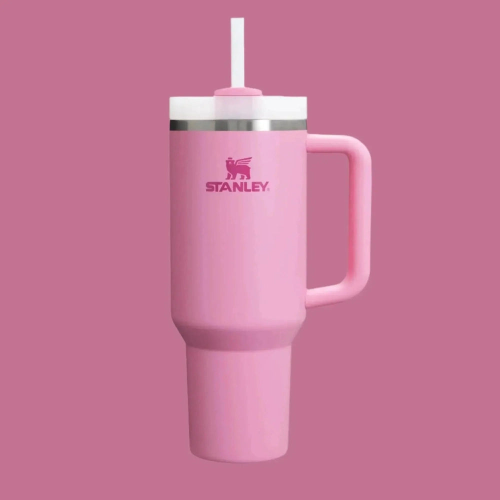 Stanley The Quencher H2.0 Flowstate Tumbler 30 oz in pink, with straw in lid and sturdy pink handle shown.