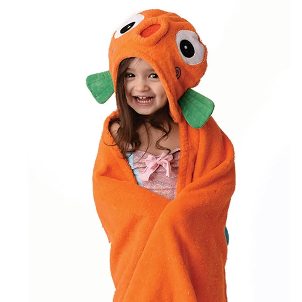 Zoocchini Toddler Towel hoodie in bright orange with green fins, child smiles while wrapped in the cozy towel.