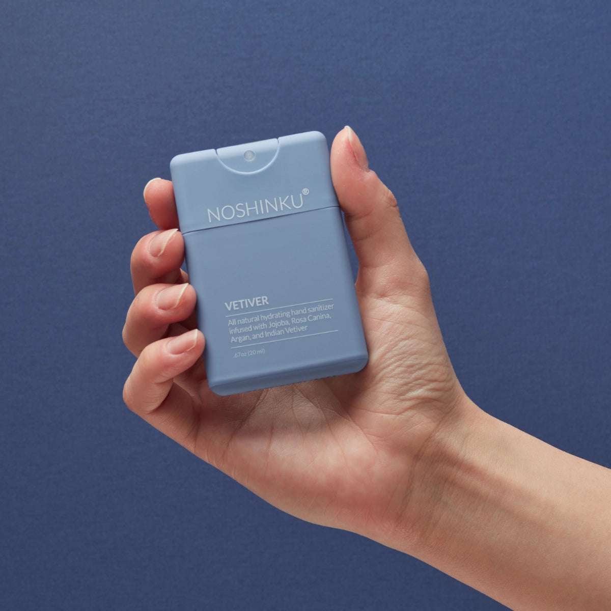 Noshinku pocket hand sanitizer, blue rectangular bottle