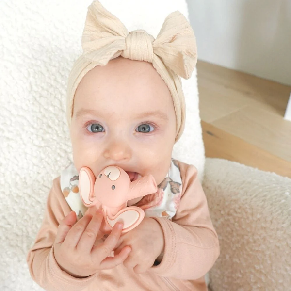 Itzy Ritzy baby molar teether, peach pink bunny-shaped