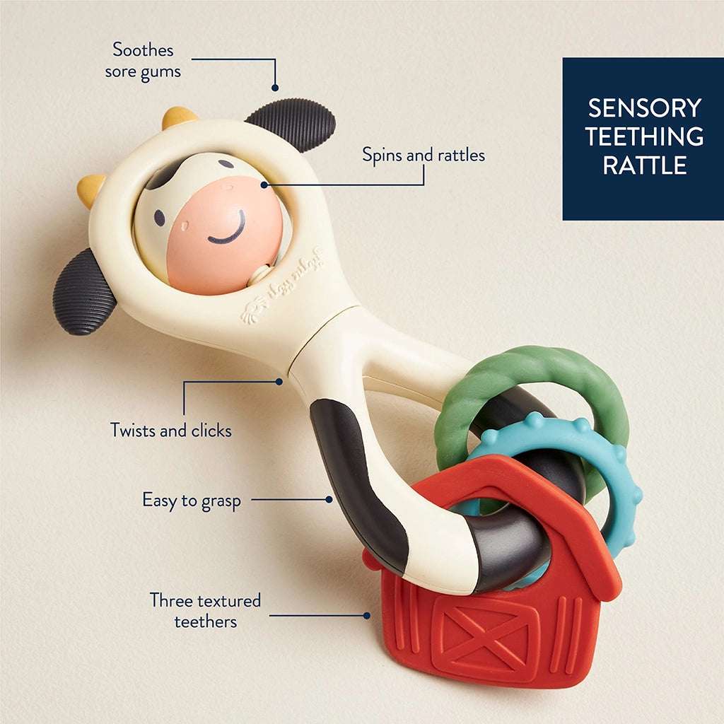 Itzy Ritzy Itzy Spinner baby teething toy with cream body and colorful rings