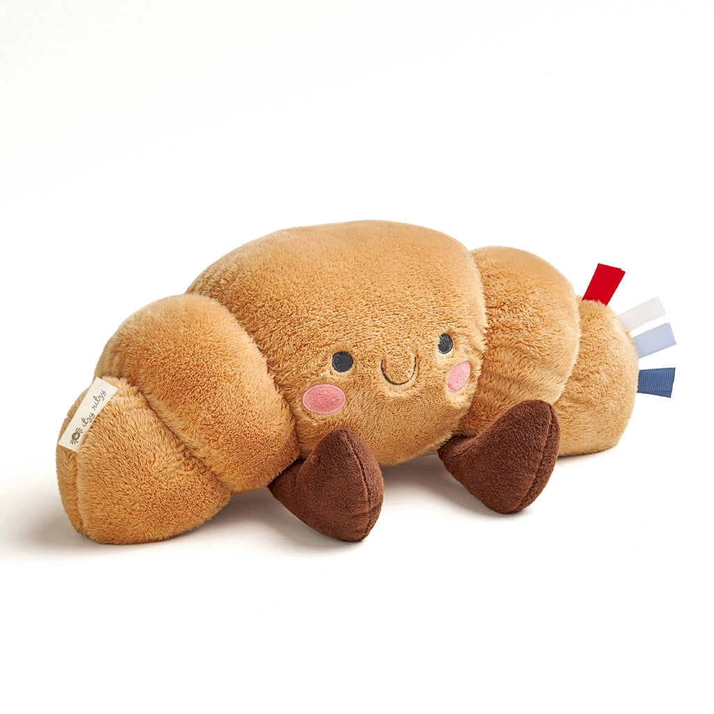 Itzy Ritzy Sweetie Snuggles plush, tan round shape with brown feet