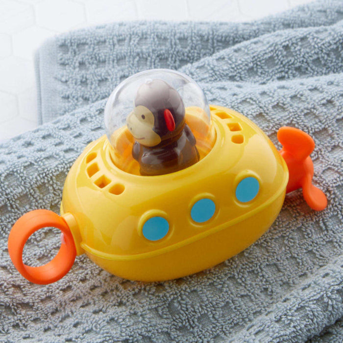 Skip Hop Zoo Pull & Go Submarine bath toy, yellow submarine with blue buttons, orange propellers and clear dome over a monkey figure