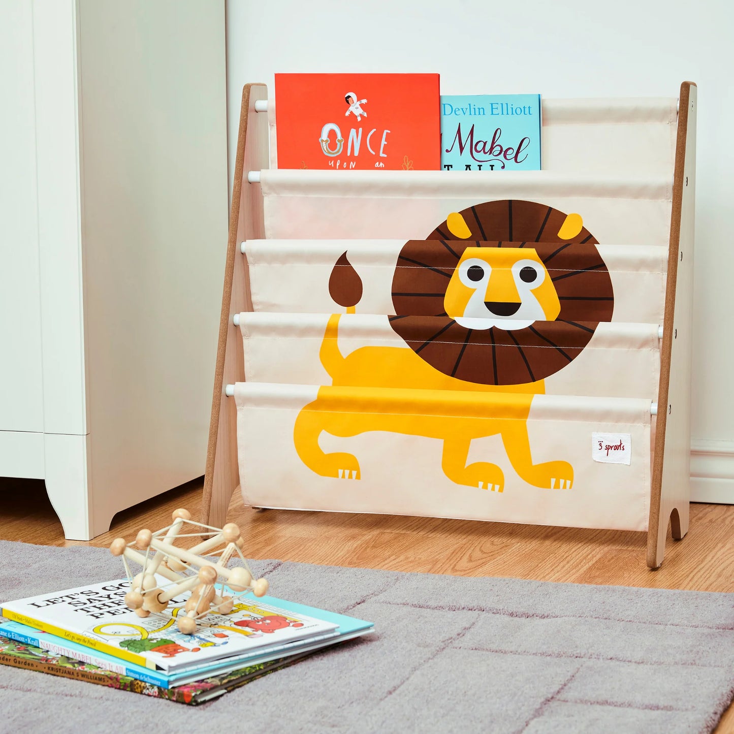3 sprouts book rack with lion print fabric pockets and wood frame