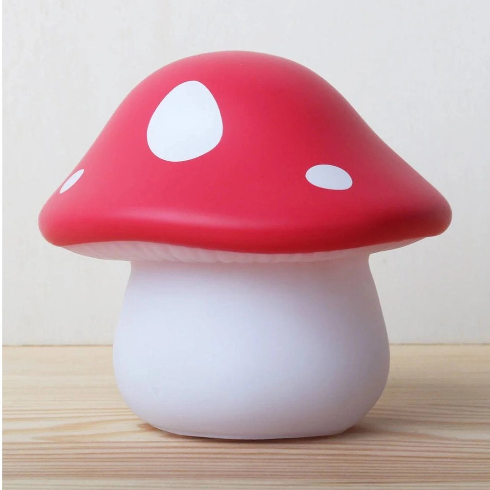 A Little Lovely Company Little Light red mushroom night light with white spots, warm glow.