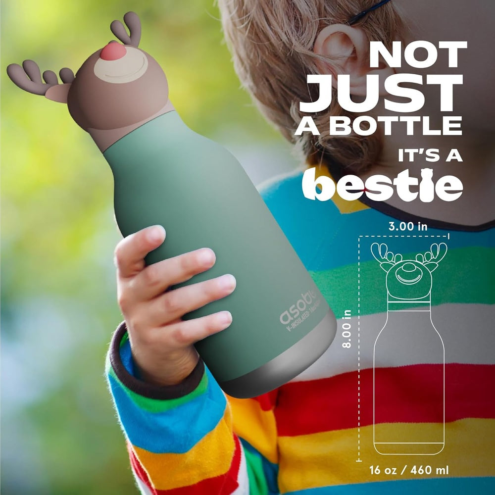 Asobu Bestie Holiday Bottle 16oz Reindeer in green held by child outdoors, colorful striped shirt.