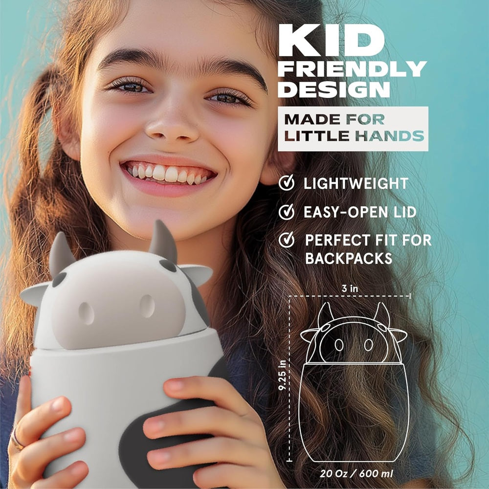 Asobu Foodie Holiday Kids Insulated Food Jar 20oz Cow, smiling girl holds the cow-themed thermos securely.