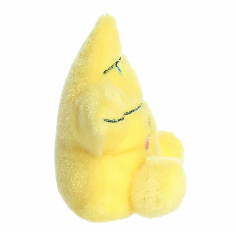 Aurora Palm Pals Navi Star Topper 5-inch yellow plush star sitting with closed eyes in a cuddly pose.