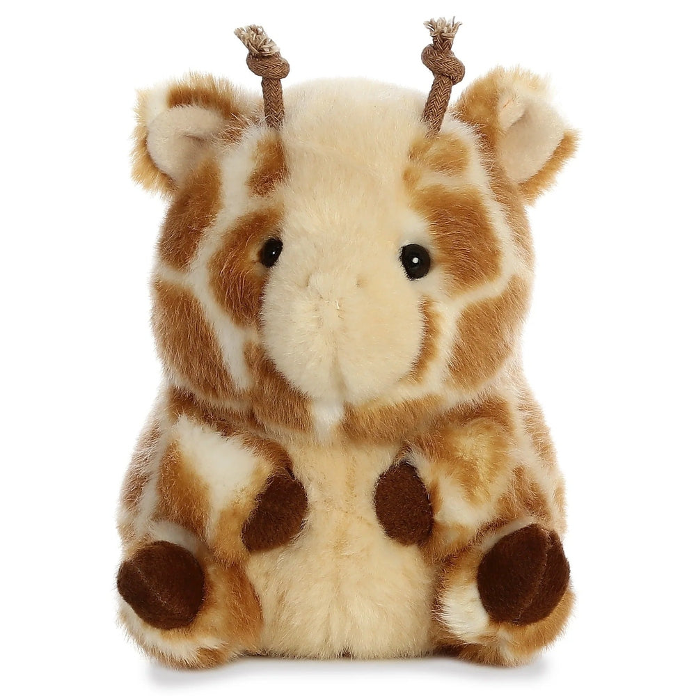 Aurora Rolly Pet Giminy Giraffe 5" plush toy sits upright in soft tan/brown fur with stitched eyes.
