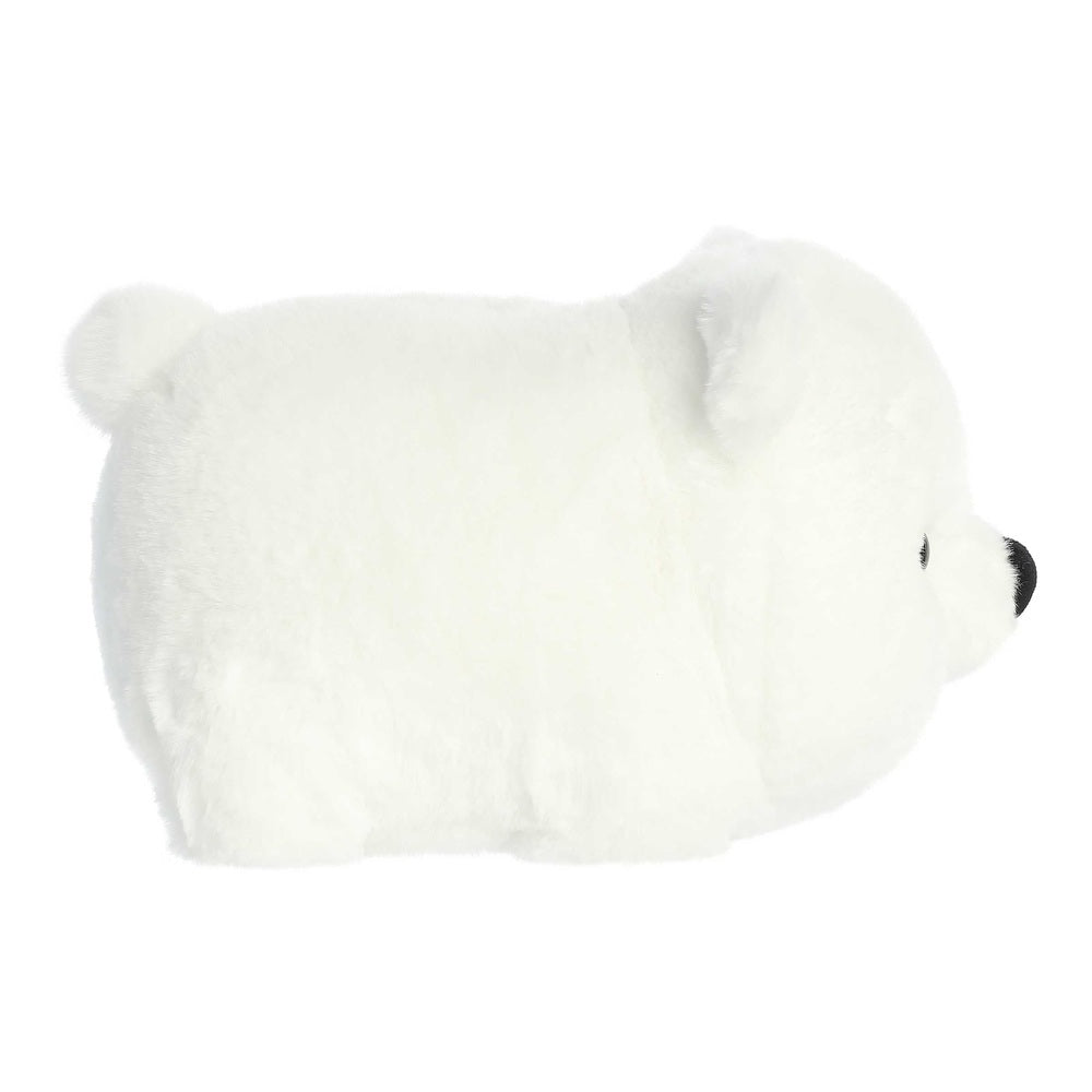 Aurora Spudsters Penni Polar Bear plush toy, white fur, 10-inch, lying on its side to show soft plush.