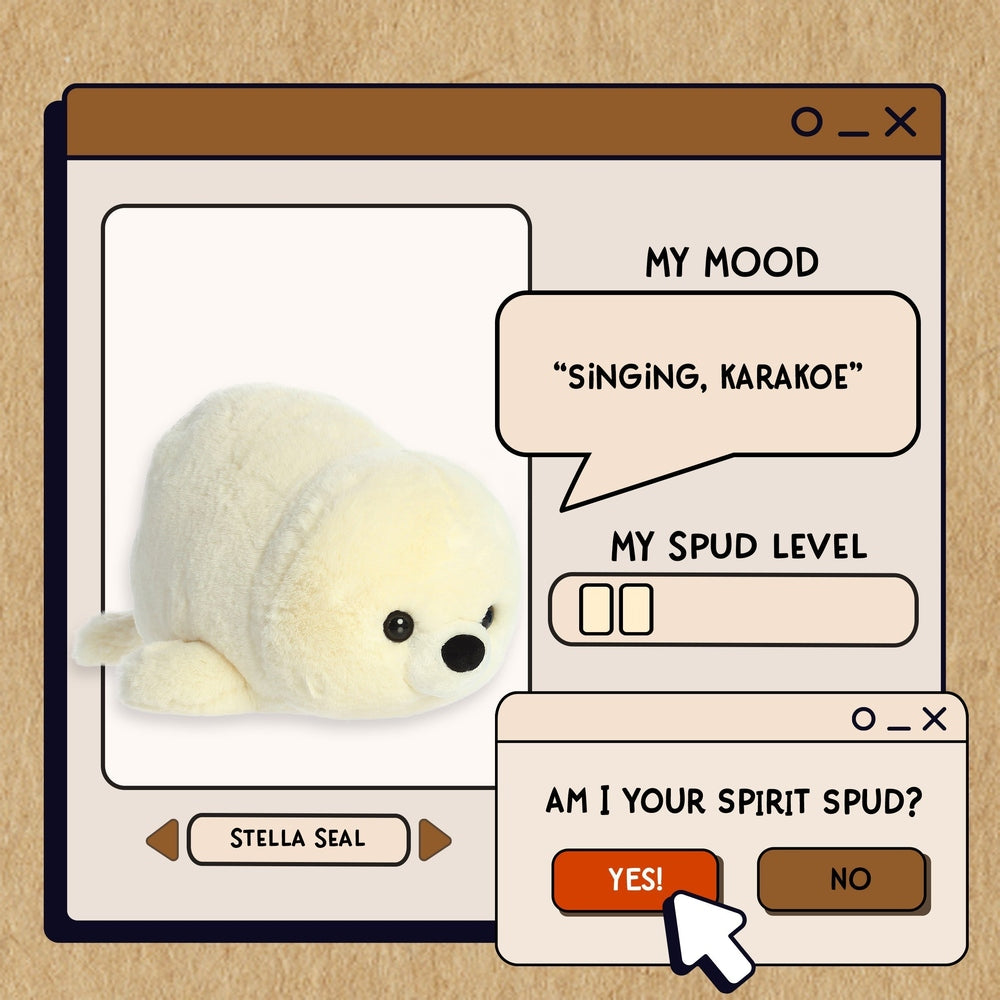Aurora Spudsters Stella Seal 10" plush toy displayed in a mock computer window, cream fur and soft plush texture.
