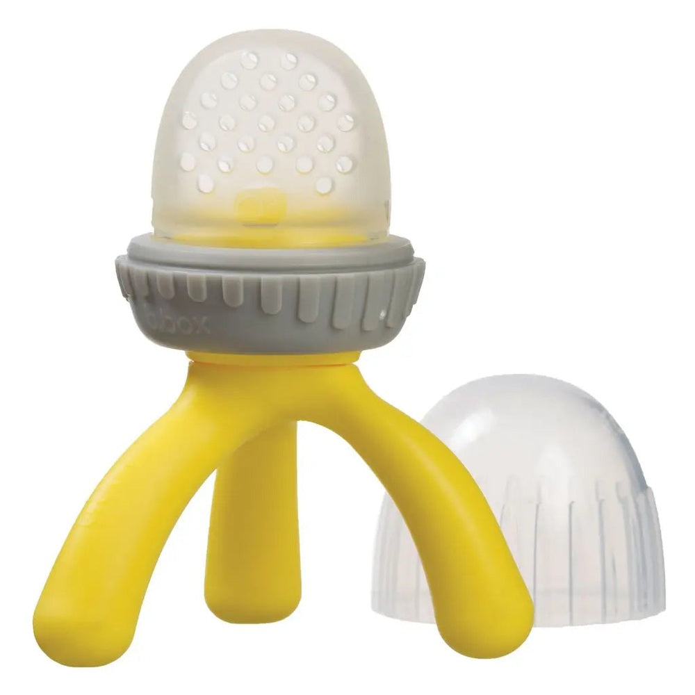 B.BOX New Silicone Fresh Food Feeder with yellow three-prong handle and clear nipple cap, grey ring.