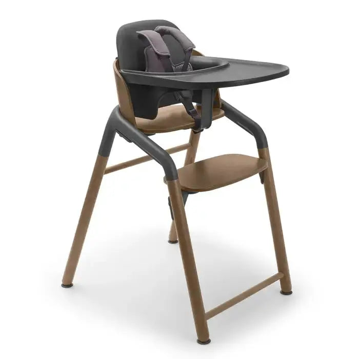 Bugaboo Giraffe high chair with natural wood legs and gray tray