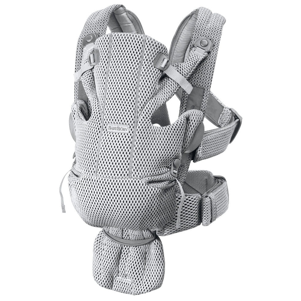 BabyBjörn Baby Carrier Free in gray mesh, worn with padded straps and waist belt for ergonomic, breathable support.