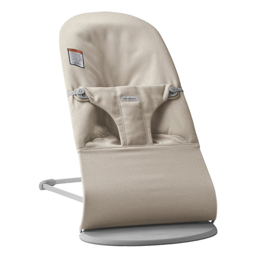 BabyBjörn Bouncer Bliss beige fabric infant bouncer with gray frame and base.