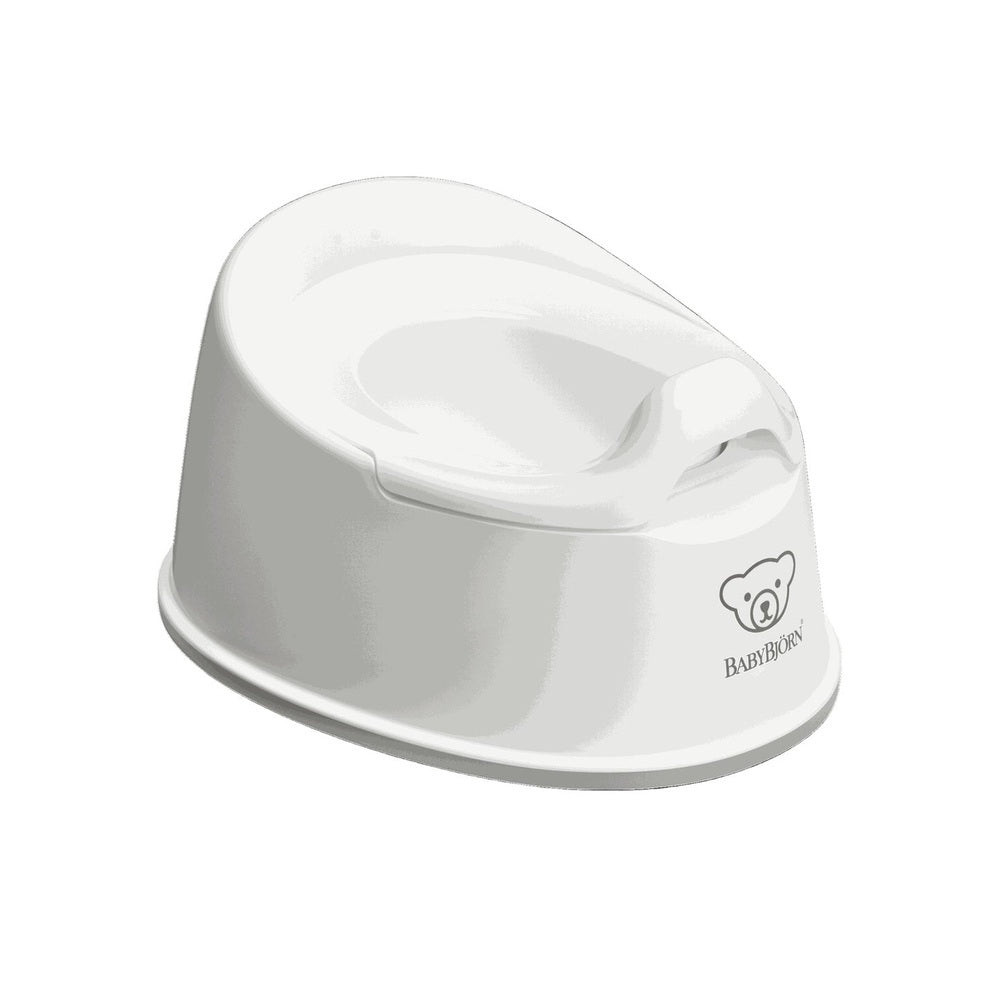BabyBjörn Smart Potty in white with curved splash guard and sturdy base for mess-free use.