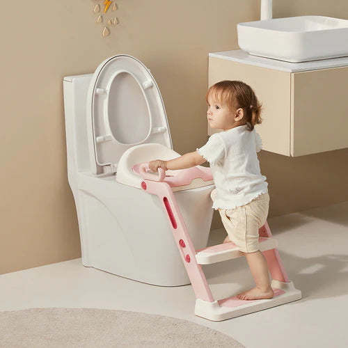 BC Babycare ladder potty training seat pink with attached pink step stool; toddler at a toilet.